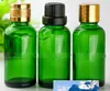 شحن مجاني 440pcs 30ML زجاجة قطارة الزجاج الأخضر، 30 مل زجاجة زجاجية خضراء مع أسود، فضة، قبعات ذهبية، زجاجات مستحضرات التجميل 1oz