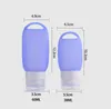 Siliconen 40 ml 60 ml herbruikbare draagbare 4 kleuren lege alcohol fles kleine maat reizen hand sanitizer fles met houder haak sleutelhanger drager