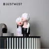 Statua di una ragazza Arte creativa Oggetti decorativi casa soggiorno camera da letto decorazione morbida figure di bambole decorazioni in resina