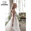 Spaghetti Straps Scoop Wedding Dress Ärmlös 3D Blomma Lace Appliques Backless A Line Tulle Illusion Bridal Gown med tåg