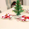 クリスマス装飾サンタクローススーツナイフフォークテーブルウェアバッグホルダーケースホームクリスマスパーティーの装飾ウィルと砂浜のギフト
