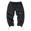 Nowy Spring Joggers Ankel-Długość Spodnie Harema Męskie Front Kieszenie Dresy Męskie Luźne Harajuku Hip Hop Track Spodnie 5xl Mid Flat