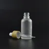 100 stcs 30 ml matte barnsteen glazen fles met bamboe dop met papieren buisverpakkingsschaal druppelaar