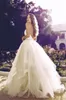 Jolies robes de mariée en tulle ligne A Applique dentelle ivoire Puffy jardin robes de mariée sexy dos nu bretelles spaghetti Boho Beach robe de mariée