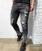 Hot Sale-Byxor Grå Fot Zipper Designer Man Jeans Casual Fashion Elasticity Penna Byxor Ungdom Hål Personlighet Mens