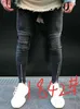 Vendita calda-Nuovi jeans skinny da uomo Jeans da motociclista sottili casuali Pantaloni strappati hiphop con foro al ginocchio denim Pantaloni lavati di alta qualità Spedizione gratuita