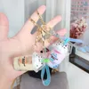 Keychains Cartoon Cute Cat Car Keychain Creative Milk Tea Cup Liquid Crystal Quicksand Sequin Key Ring Bag Pendant 20204533319