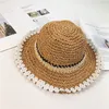 2020 Nuevo Sombrero de paja para niños Versión coreana Pequeñas flores frescas Sombrero de pescador para bebés Protección solar para niñas Sombreado Sombrero de playa al por mayor