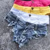 Nuove donne estive sexy vita bassa buco nappa pantaloncini di jeans spiaggia jeans pantaloncini clubwear S M L Xl 210306