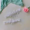 Amazing Beach Wedded Bridal Garters Set Med Blå Beaded Sexig Lace Bridal Ben Tillbehör för Bride 2020 Billiga Underkläder Garter Lace Belt