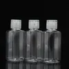 透明なプラスチックの空のボトル30ml 60ml補充可能なトラベルコンテナシャンプーリキッドローション用のフリップキャップ付き化粧ボトル