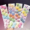 10pcs/تعيين فتيات جديدات لطيف زهور ملونة نطاقات مرنة الأطفال حامل ذيل حصان Scrunchie Rubber Band Association