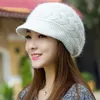 矢印デザインニットの素敵な女性冬のベレー帽の暖かいフェイクの毛皮の裏地アンゴラスタイルの色の女性帽子卸売