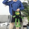 Lyxiga handväskor Purses Japan och Sydkorea Designer Ny stil Sad Frog Canvasväska Kvinna One-Shoulder Koreansk stil Ins Cross-Body