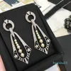 Vente chaude C2271 Haute qualité 2020 exquis et de haute qualité intégré zircon cubique perle géométrique boucles d'oreilles pendentif bijoux en métal lourd