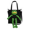 Lyxiga handväskor Purses Japan och Sydkorea Designer Ny stil Sad Frog Canvasväska Kvinna One-Shoulder Koreansk stil Ins Cross-Body