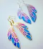 Pendientes de alas de mariposa de colores degradados transfronterizos accesorios de oro y plata de plumas de ensueño