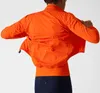 2020 Ganzjahres-Orange, leichte Rad-Regenjacke, winddichte Technologie, hoch atmungsaktive, wasserdichte Jacke aus 3-lagigem Stoff1101864