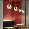 Nordic Creative Minimalistyczny stół jadalny Wisiorek Lights Stół Single-Head Mosiądz Chandelier Cafe Decoration Sypialnia Lampa wisząca