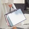 Customize Design Kraft Fancy Shopping Paper Bag Printing White Carrier Bags