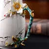 Tasse à café en porcelaine d'os, tasses à lait, tasse créative en émail, tasse à café à fleurs avec cuillère, cadeau d'anniversaire et de mariage, ustensiles ménagers