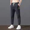 Высококачественные мужские хлопчатобумажные бельевые брюки DrawString Mid Plane Pocket Свободный карандаш Повседневная Двухместная спортивные штаны Брюки