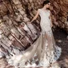 Abiti da sposa a-line champagne boho con strascico staccabile senza maniche abito da sposa in pizzo con applicazioni cappella abiti da sposa su misura