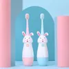 AZDENT Kids Children Rabbit Ultrasonic Electric Toothbrush 5 Bristle Head One Button Operation Powered by 1AAA Battery Pink Blue