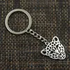 Mode 20st / lot nyckelring keychain smycken silverpläterad ihålig leopard huvud charm hängsmycke nyckel tillbehör