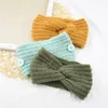 Strickstirnband -Stirnbänder Winter warmes Strickkopfschreiben mit Knopf für Ohrschutzdesigner Maskenhalter Haare D827014828614