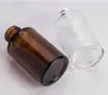 30mlのガラスのびんの平らな肩の艶消しの透明な琥珀色のガラスラウンドエッセンシャルオイルの血清のびんのガラスの薄片の香水瓶の瓶
