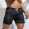 Cortometraggi da uomo Summer uomini fitness per bodybuilding uomo solido palestre di allenamento maschio a maglia traspirante per nuoto sport jogger spiaggia pantaloni corti