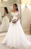 Appliques de fleurs Robes de mariée en dentelle à manches longues couche une ligne 2021 Spring Charming Bridal Robes Sweep Train Custom Plus Size9056737