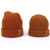 New Arrival Classical Knit Warm Hats Adult And Kids Size Pure Colors Beanies With Pig Nose Tag Solid Cap Whole2897178