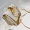 Elegant Kvinna Metall Ring Tote Bag 2020 Sommar Ny Högkvalitativ PU Läder Kvinnors Designer Handväska Kedja Shoulder Messenger Bag
