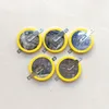 tagged Pile bouton au lithium CR2025 3V avec broches soudées Languettes pour les joueurs Type de montage plat horizontal CR2025-1F2