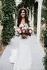 Land Lace Bröllopsklänningar Mermaid Bridal Gowns Sexig Open Back Illusion Långärmad Vintage Utomhus Brudklänning