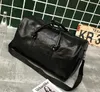 55 cm axel män empreinte väska präglade lyxdesigner rese bagage crossbody män totes pu läder duffel handväska duffelväskor