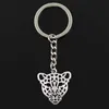 Mode 20st / lot nyckelring keychain smycken silverpläterad ihålig leopard huvud charm hängsmycke nyckel tillbehör