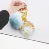 2020 High-end Custom Crystal Epoxy Letter Golden Keychain Star Fur Ball Bag Pandent Creativity Key Ring Oem Number Keychains