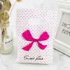 New Design 15x20cm Hot Pink Polka Dot Bow Jewelry Plastic Bag With Handles 100pcs Shopping Bag Packaging Wedding Decoration