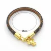 Europa América Moda Nuevo Estilo Señora Mujeres Impresión Redonda Diseño de Flores Grabar Letra V Borlas Charm Pulsera de Cuero Brazalete7017724