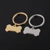 100% acier inoxydable chien os porte-clés blanc pour graver métal chien os étiquette charme porte-clés miroir poli en gros 10 pièces