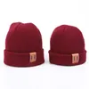 New Arrival Classical Knit Warm Hats Adult And Kids Size Pure Colors Beanies With Pig Nose Tag Solid Cap Whole2897178