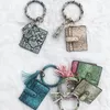 Tassels Nyckelringar Kreditkortshållare Bag PU Läder Snakeskin Korn Skriv ut Armband ID Kort Handväska med nycklar Ring Keychain Byt noll plånbok