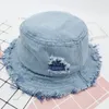 Versatile personalità della protezione dei bambini del 2020 denim del foro nuove primavera ed estate di stile giapponese rotto filo grezzo del pescatore bacino Cappello all'ingrosso