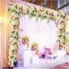 人工アーチの花の列テーブルランナーの中心深さの結婚披露宴の道の弦の文字列を引用した花の装飾10個ごとに10個
