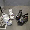 Corea moda sandalias Chunky para las mujeres 2020 de la plataforma de cristal Verano Zapatos Mujer Negro talones de cuñas 10cm envío rápido
