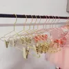 50PCS Nordic Style Rose Gold Metal Pants Kjol Släck Hängare med Clips Hängare Rack Klädaffär Garderob Arrangör # 39107