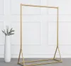 "Gold Clothing Shelf for Women's Wardrobe Organization - Stylish and Functional Bedroom Furniture for Adult Clothes Hanging and Display Racks"